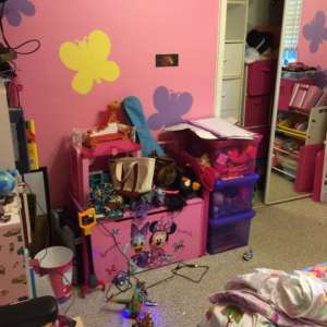 Before-Girl's Room:Bed at Entry-No Floor Space; Toys overflowing